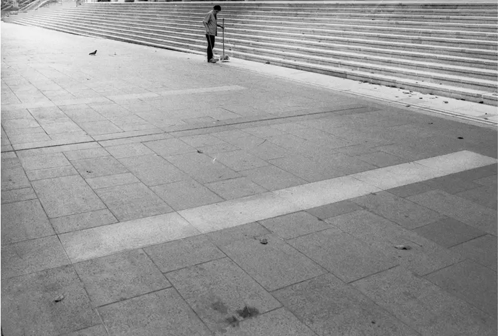 Man sweeping the pavement, Singapore - Leica M6 / 28mm Elmarit / Ilford HP5+ / Ilford HC