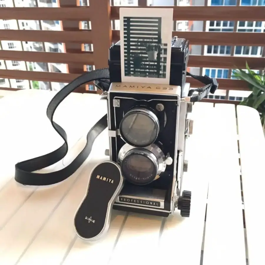The Mamiya C33 with one of the Instax Mini Monochrome sheets it produced!