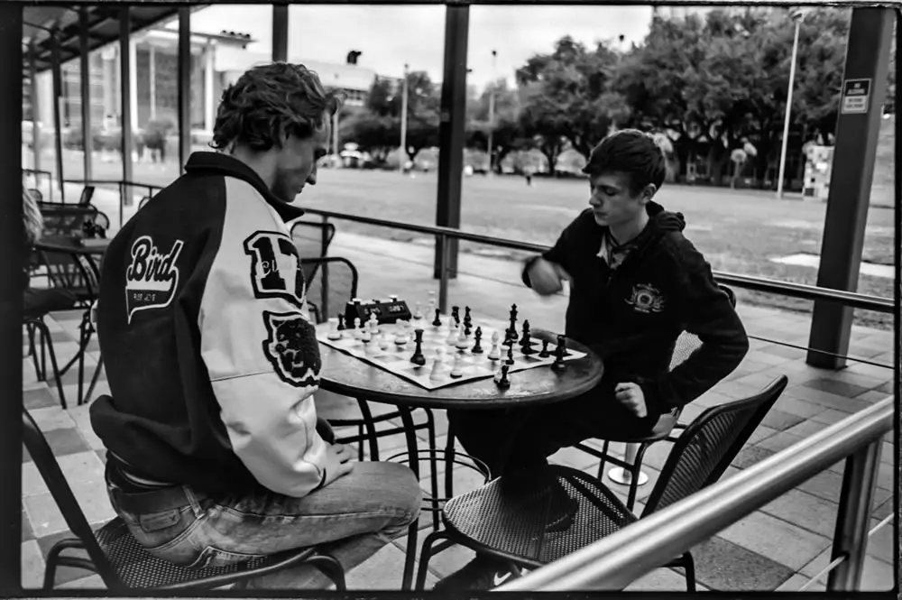 Put Some Rest On Your Chess (Houston, Texas) - Canon FTQL - Canon FD 28mm F/2.8, Ilford FP4 Plus