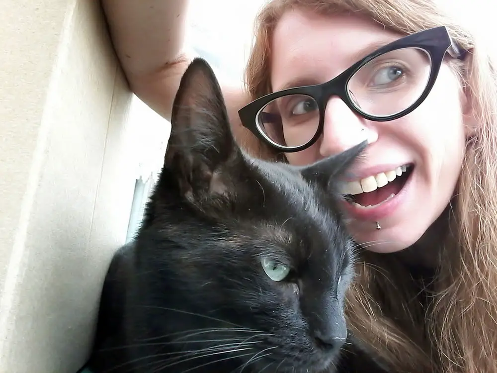 And here’s a picture of me, it’s a dorky selfie with my cat Loa!
