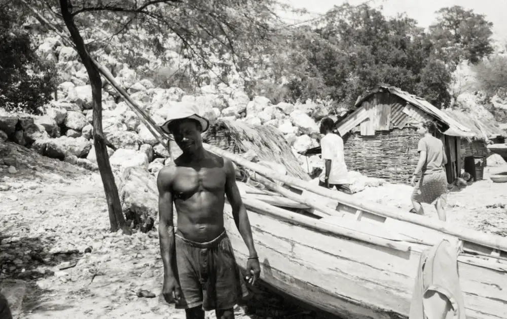 Fisherman in Haiti by his boat - Kodak BW 400CN Disposable