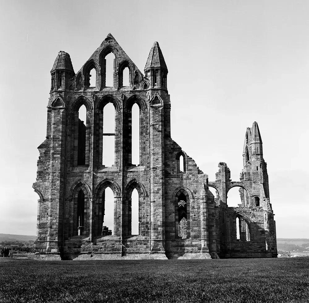 Whitby Abbey, Rolleiflex, ILFORD FP4+ - Visiting Whitby was not in my itinerary when I was travelling through the UK. But after a tipsy conversation with a bartender and a 15 minute crash course by a local on how to take the 2hr journey to this little village that inspired Bram Stoker's Dracula... I just had to go visit. And I'm glad I did. Also... in my exciting to take this shot, I left my rolleiflex lens cap lying on the marsh.... it took 30 minutes for me to trace back my steps and find the damn thing.