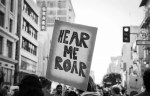 Hear me roar - Women's March, Los Angeles. Canon EOS-3, Fujifilm Acros 100