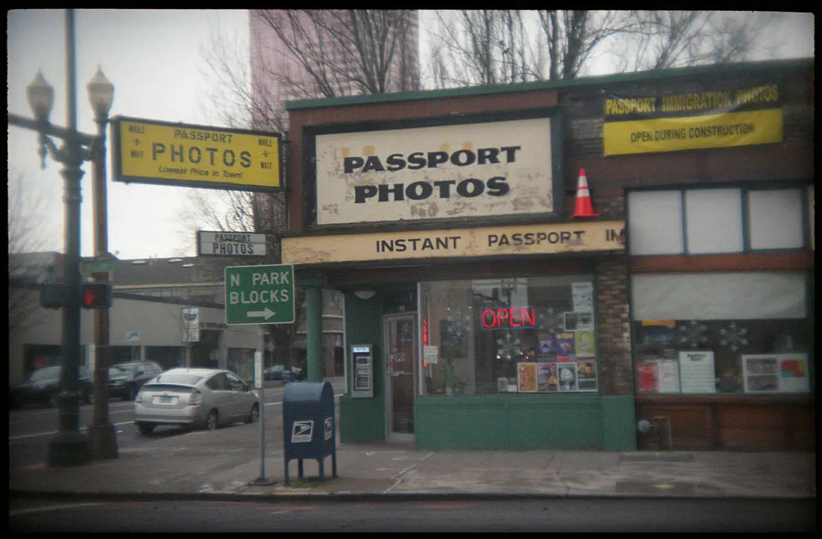 Holga 135BC, Lomography Color Negative 400 film. The old photostore in downtown Portland, Oregon.