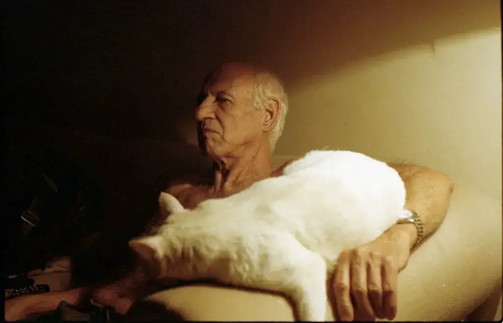 My grandfather Paulo, watching TV with Charlote. Shot on Kodak Portra 400