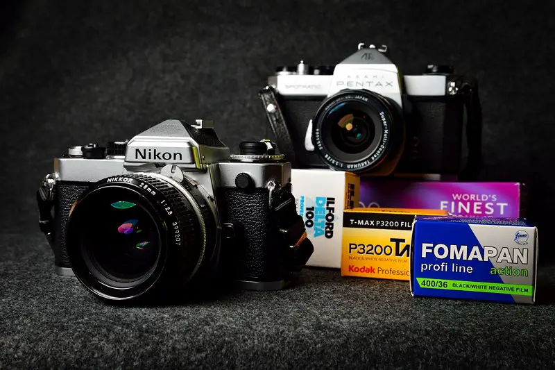 Nikon FE and Pentax Spotmatic cameras with various 35mm films