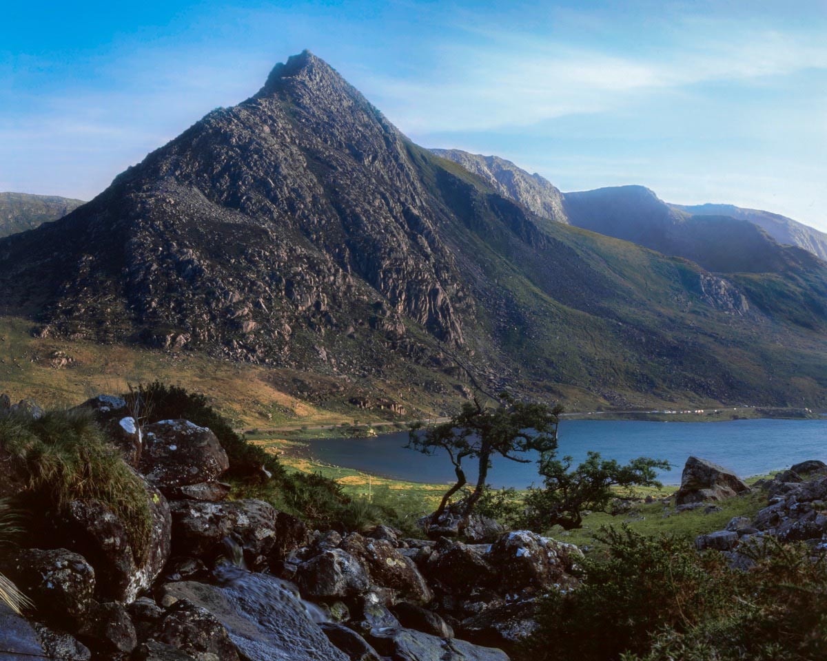Tryfan; To emphasise the shadow and texture of the rock in both the foreground and background, I opted for the contrastier Fuji Velvia 50.
