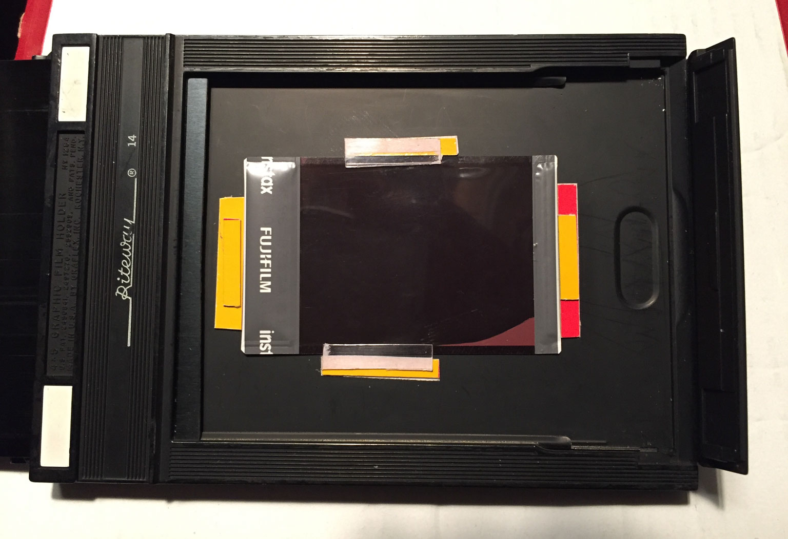 5 x 4 film holder loaded with Instax Mini film
