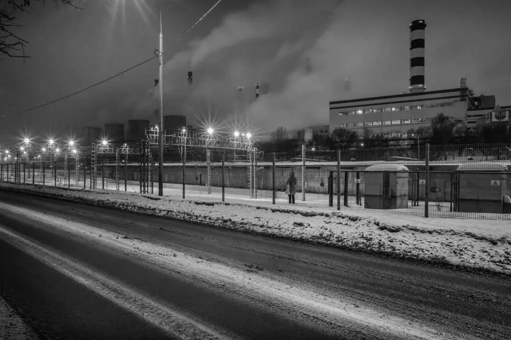 Smokestacks and lights along Kanatchikovsky Pereulok.
