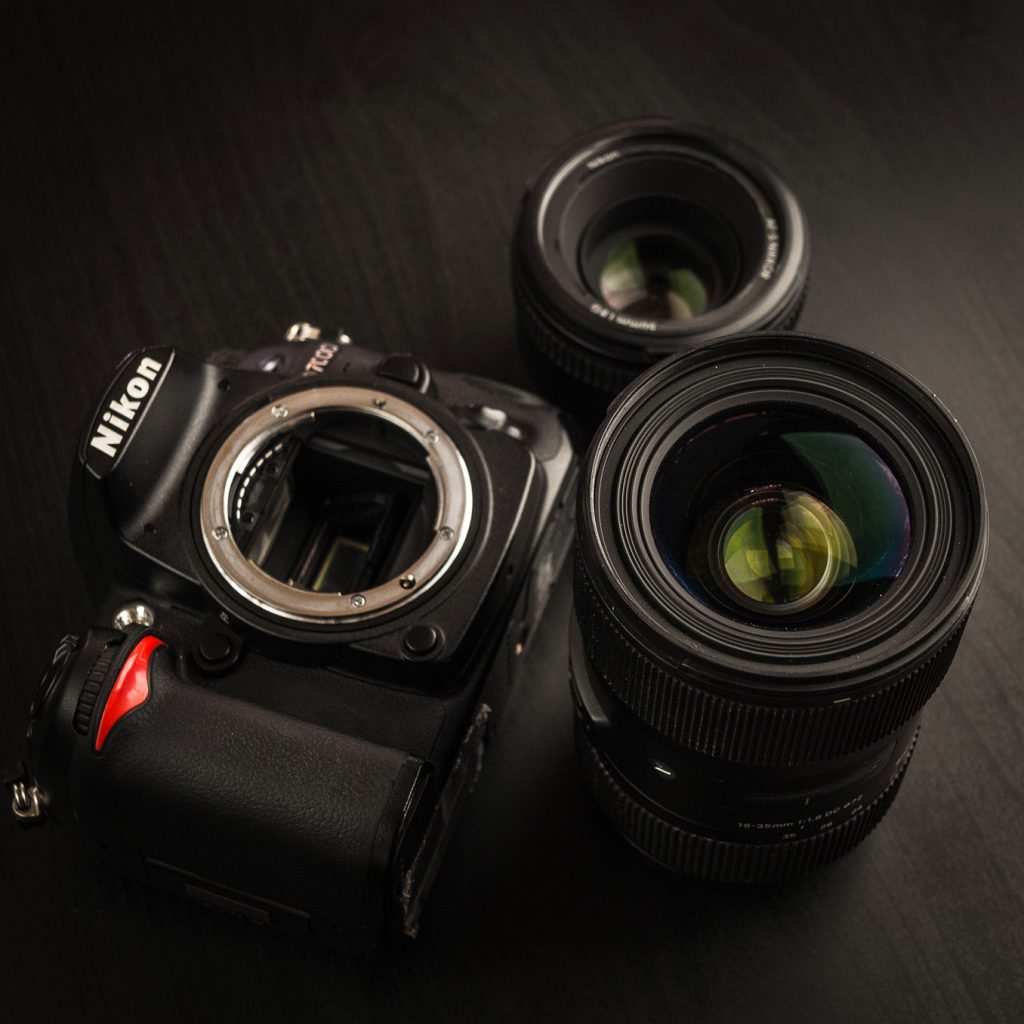 Nikon D7000 with Sigma 18-35mm f/1.8 and Nikkor 50mm f/1.8