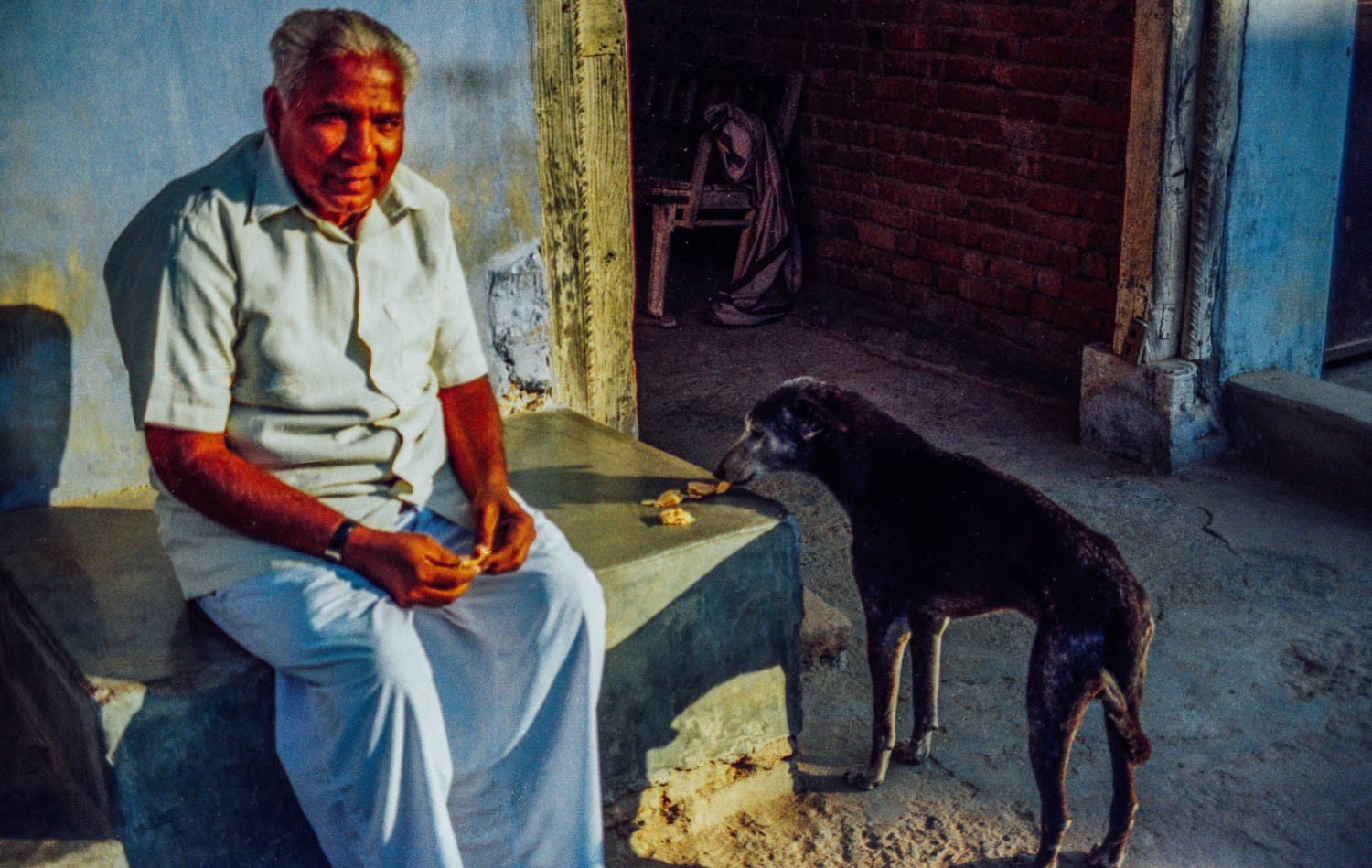 Man and dog. Jesangpura, India. Yashica FX-D
