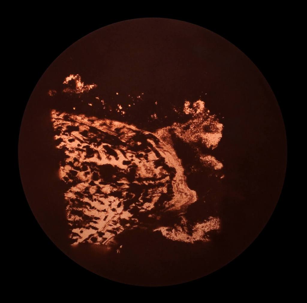 Uraninite with bornite inclusion, Blue Lizard Mine, Red Canyon District, Utah, USA” 	15”x15” Circular Uranotype from uranium autoradiogram. Autoradiogram: Kodak T-MAX 400, 48 hours exposure, developed in PMK.
