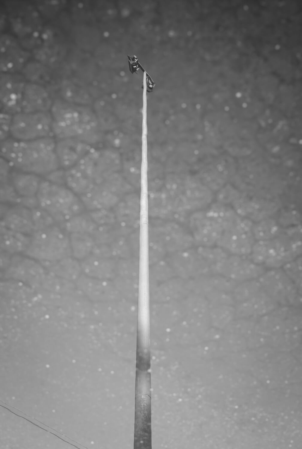 LSD trip pole. taken in a puddle on bitumen. Yet it looks like a sci-fi vision of poleness in the future.