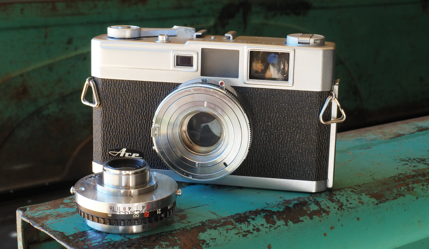 The Olympus Ace's Copal SV leaf shutter and the unique Ace lens mount.