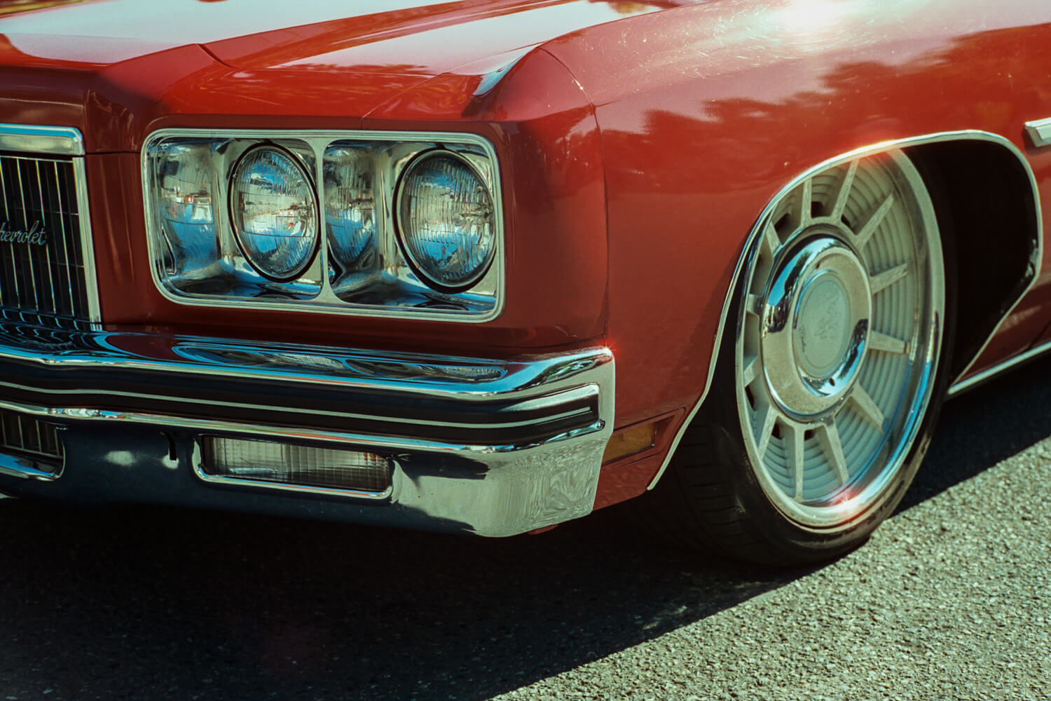 CineStill 400D - Hexar RF - Hexar RF - Red Lowrider - You can see the greenish undertone on this shot along with some halations on the shiny chrome.