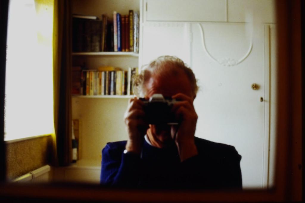 A mirror selfie by my grandfather on his Olympus OM-10