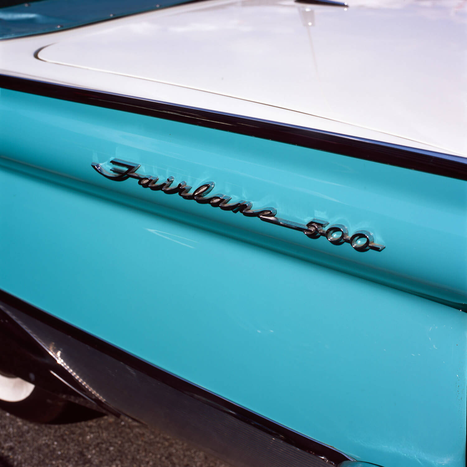 Ford Fairlane - The square format allows for enough detail at the top and bottom to identify the subject as an automobile. Shot with a Hasselblad 500CM on Ektachrome film